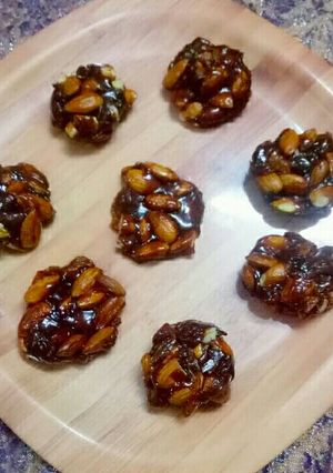 A picture of Buttery jaggery badam chikki.