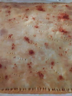 Una foto de Empanada de patatas bravas