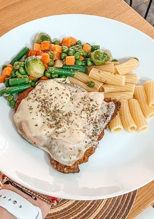Una foto de Escalope de carne a la napolitana