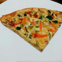 A picture of Tarta de zapallitos y verdeo.