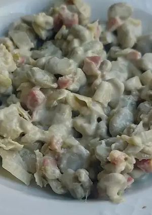 Una foto de Habitas cremosas al vino blanco