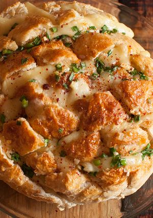 A picture of Freshly Baked Cheesy Garlic Onion Pull-Apart Bread.
