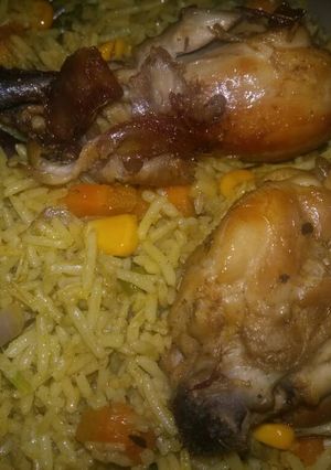 A picture of Fried Rice and Chicken.