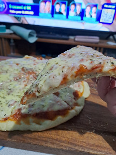 Una foto de Masa Pizza muzzarella 🍕
