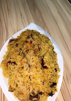 A picture of Jollouf rice with dry fish.