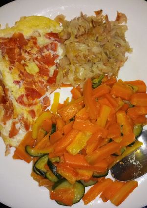 A picture of Omelette and carrots.