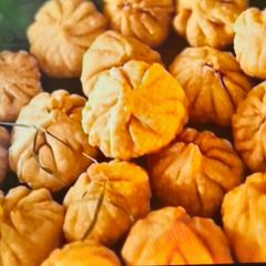 A picture of Shahi Modak - Fried Modak.