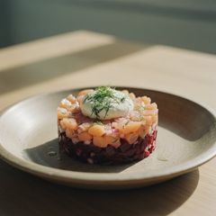 A picture of Smoked Salmon & Beetroot Tartare with Dill Creme Fraiche.