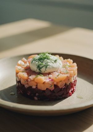 A picture of Smoked Salmon & Beetroot Tartare with Dill Creme Fraiche.