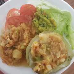 Una foto de Chayote relleno de bacalao