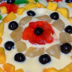 A picture of Custard with seasonal fruits.