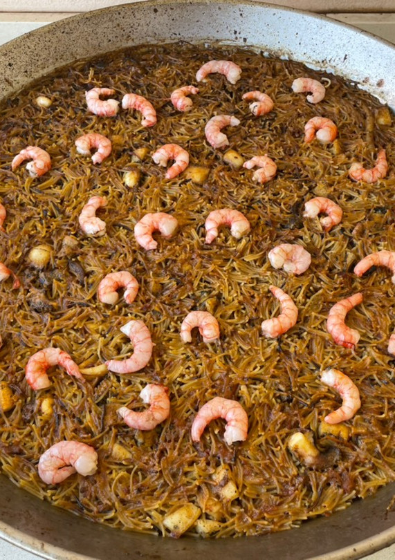 Una foto de Fideos rosejats de gamba roja