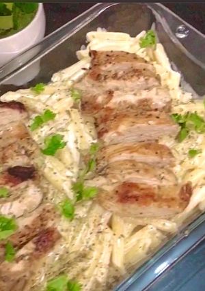 A picture of Alferado Penne Pasta with Grilled chicken..