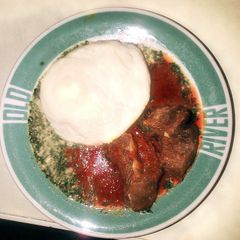 A picture of Ilase (Ewedu with melon) with semo.
