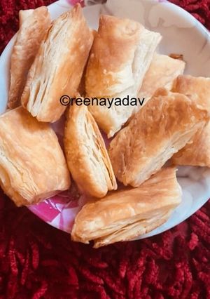 A picture of Homemade khari biscuit with homemade puff pastry sheet.