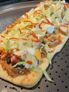 A picture of Flat bread pizza.
