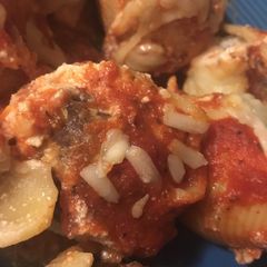 A picture of Meatball stuffed shells.