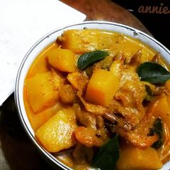 A picture of Dry shrimps pumpkin curry.