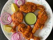 A picture of chicken drumstick baked
