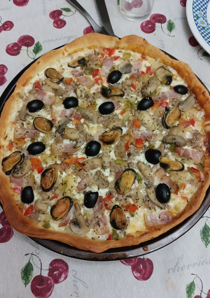 Una foto de Pizza cuatro estaciones