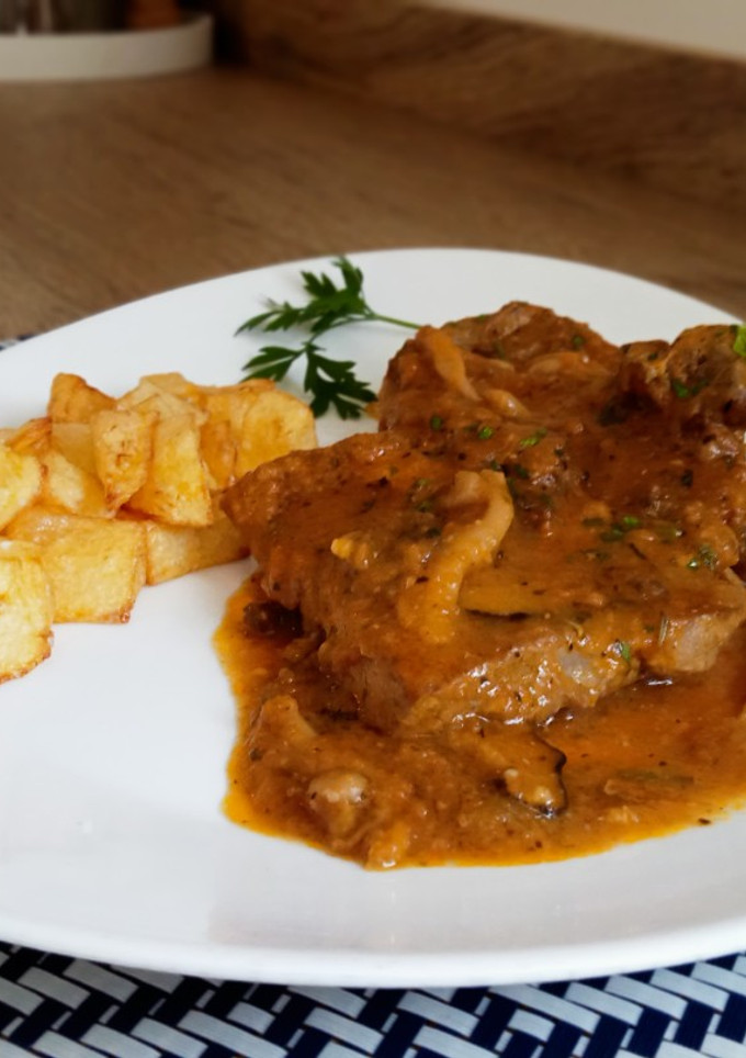 Una foto de Filetes de cerdo en salsa