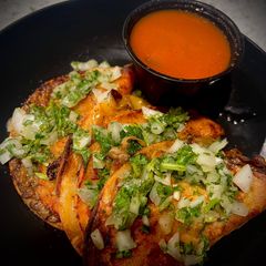 A picture of Oyster Mushroom Birria Tacos.