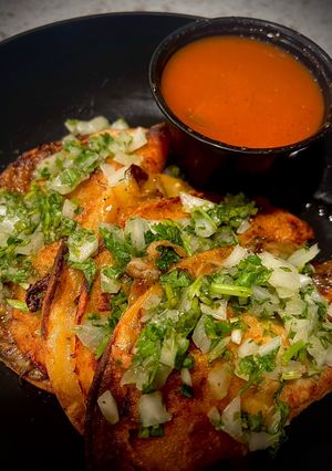 A picture of Oyster Mushroom Birria Tacos.