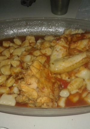 Una foto de Ñoquis de papa con salsa de pollo