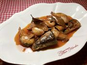 Una foto de escabeche de merluza