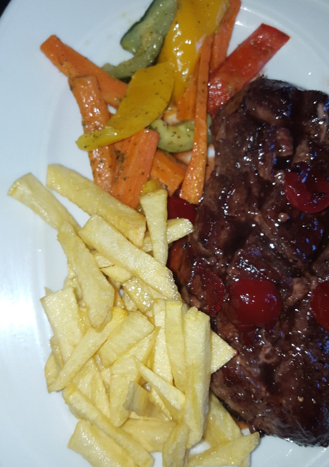 Una foto de Magre de pato con salsa de cereza