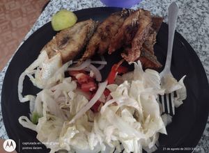 Una foto de Posta de robalo fritas