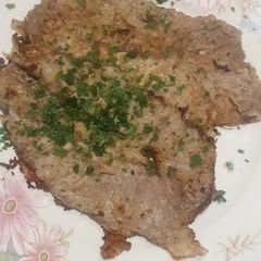 Veal slices with lemon A picture of Veal slices with lemon.