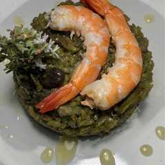 Foto di Arroz negro de habas