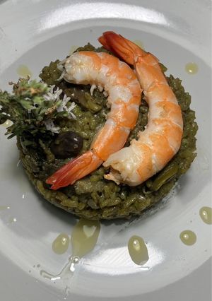 Una foto de Arroz negro de habas