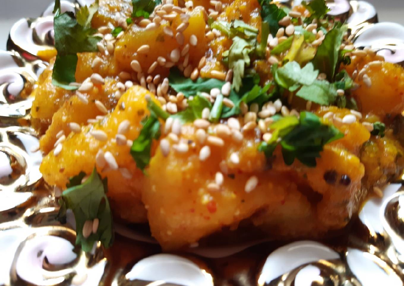 Grease Masala Potatoes with sesame seeds