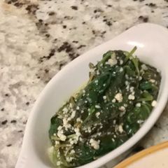 A picture of Sautéed garlic spinach.