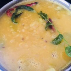 A picture of Green tomato daal.