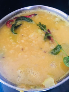 A picture of Green tomato daal.