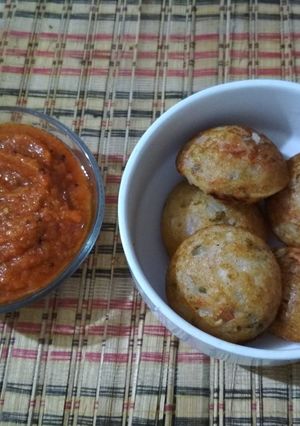 A picture of Vegetable Appe with Tomato Chutney.