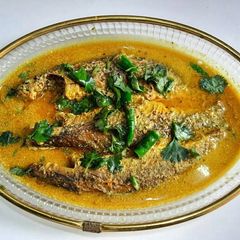A picture of Mullet Fish in mustard gravy.
