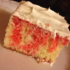 A picture of Strawberry jello poke cake .