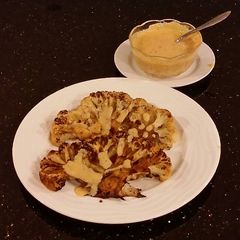 A picture of Spicy Grilled Cauliflower with Sriracha Hollindaise Sauce.