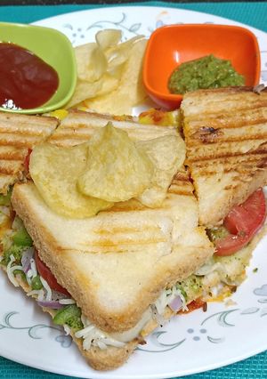 A picture of Schezwan Cheese Toast Sandwich (A Mumbai road-side delight).