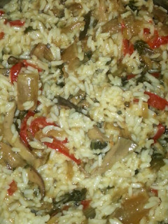 Una foto de Arroz con setas y acelgas en salsa teriyaki (vegetariano)