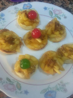 Una foto de Mini Quiche de nuez moscada con salteado de manzana caramelizada