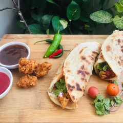 A picture of Popcorn chicken wrap.