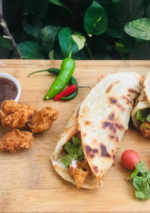 A picture of Popcorn chicken wrap.