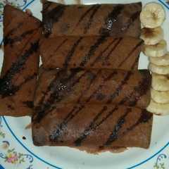 A picture of Dadar gulung pisang coklat.