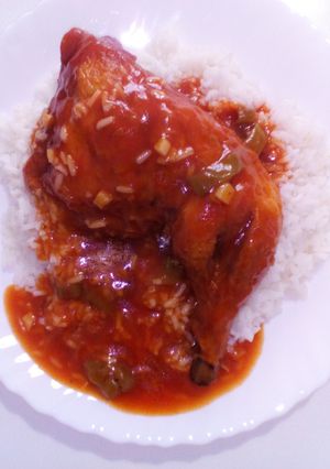 A picture of Chicken Quarters & White Rice.
