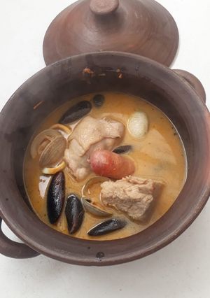 Una foto de Curanto en olla